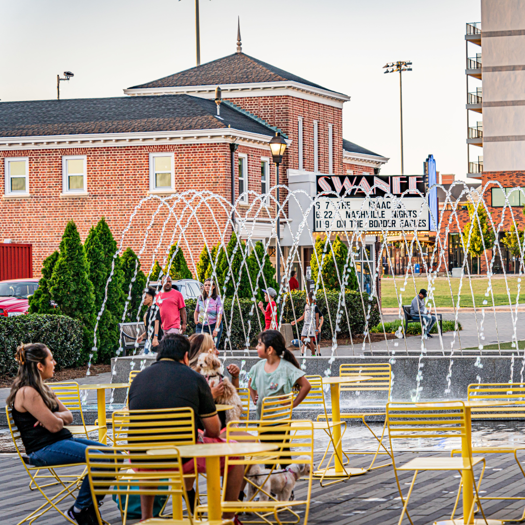 Downtown Kannapolis image with fountain and yellow benches